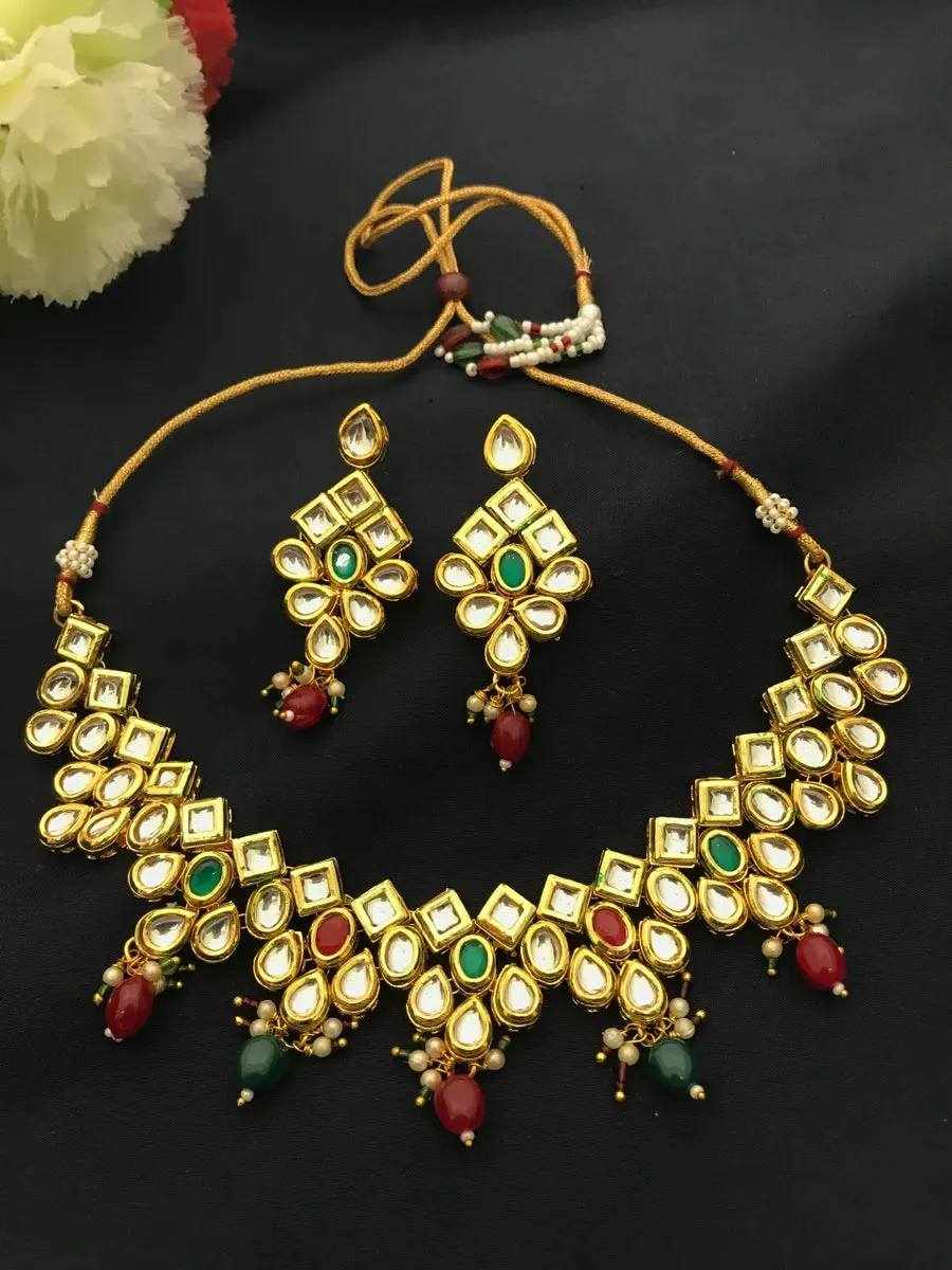 Beautiful Red And Emerald Gold Tone Matte Finished Antique Gold Necklace Set