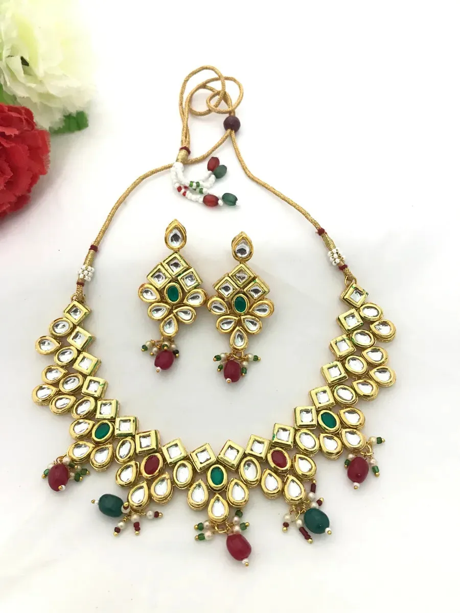 Beautiful Red And Emerald Gold Tone Matte Finished Antique Gold Necklace Set